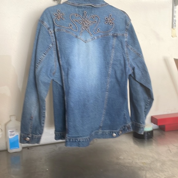 This is a Jean jacket with beautiful stitching,, it’s been worn once or twice. - Picture 2 of 4